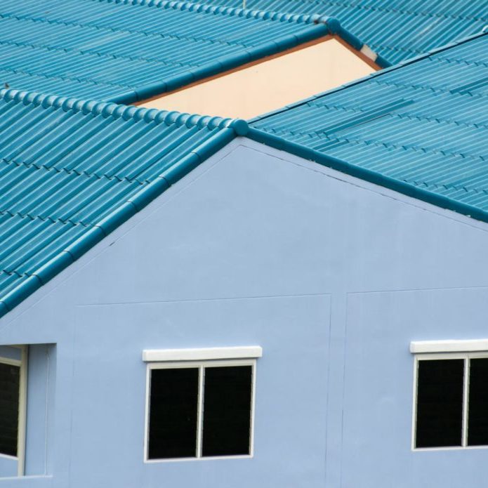 big house with blue roofing